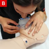 CPR Figure 16 B Give a breath for over one second and watch the chest rise